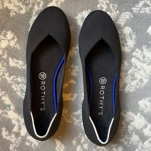 Rothy’s round toe black with white trim size 10